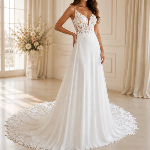 Boho lace A-line wedding dress with floral appliqué and deep V-neckline